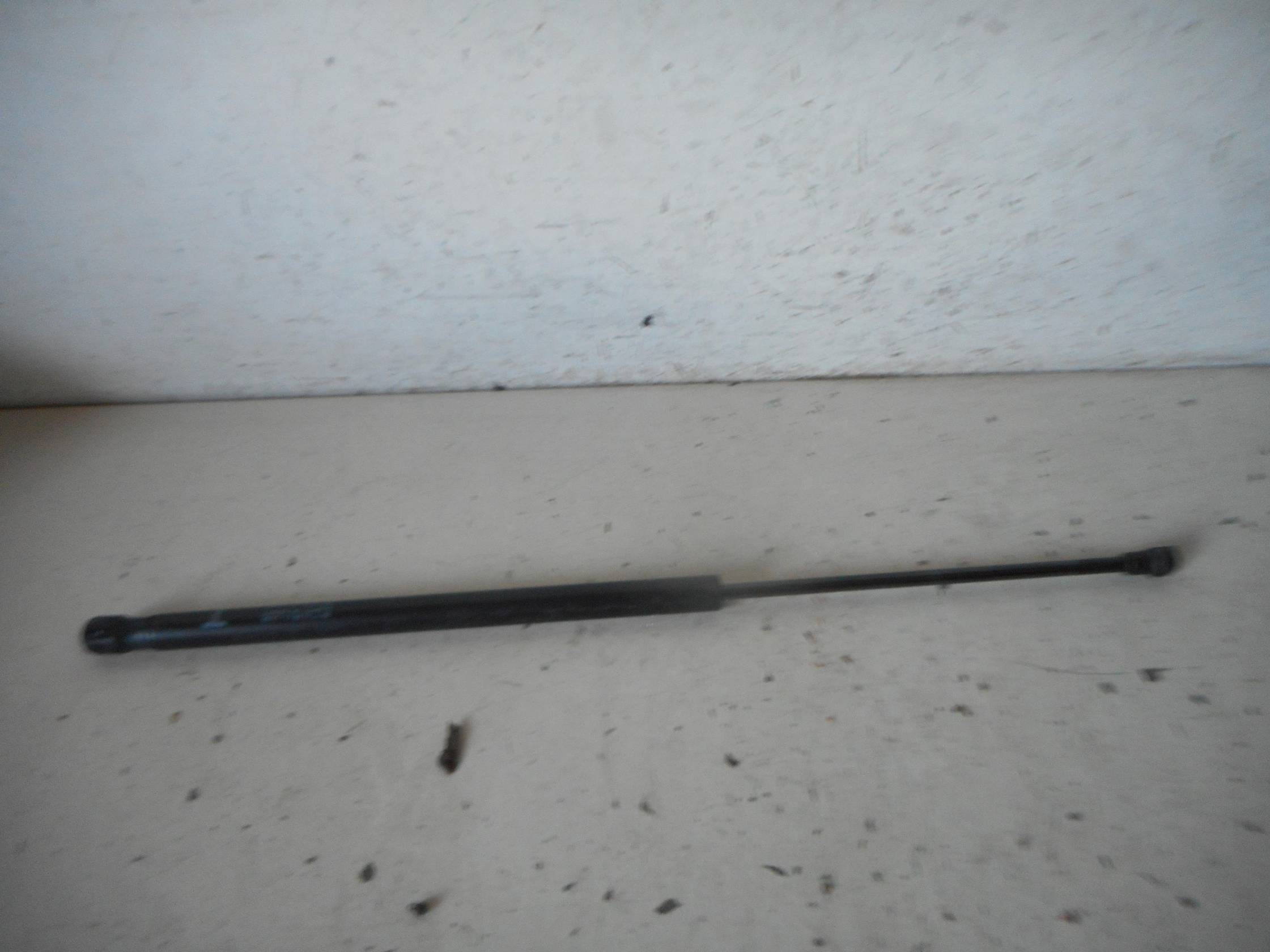 Asta ammortizzante lunotto sx.